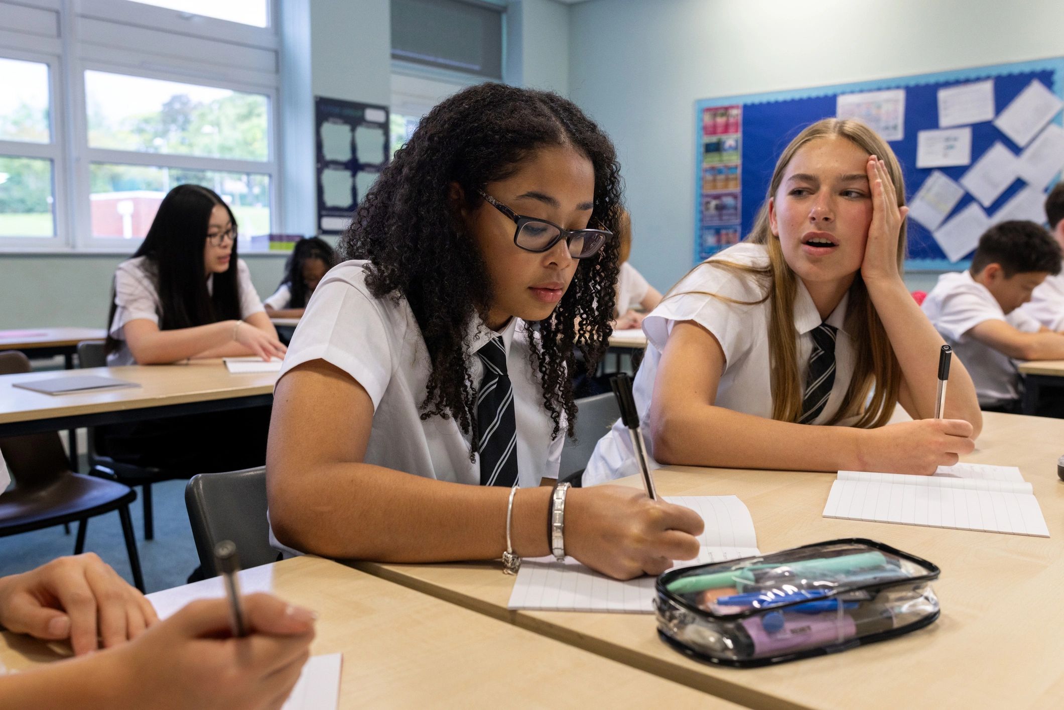 Students studying together in a classroom